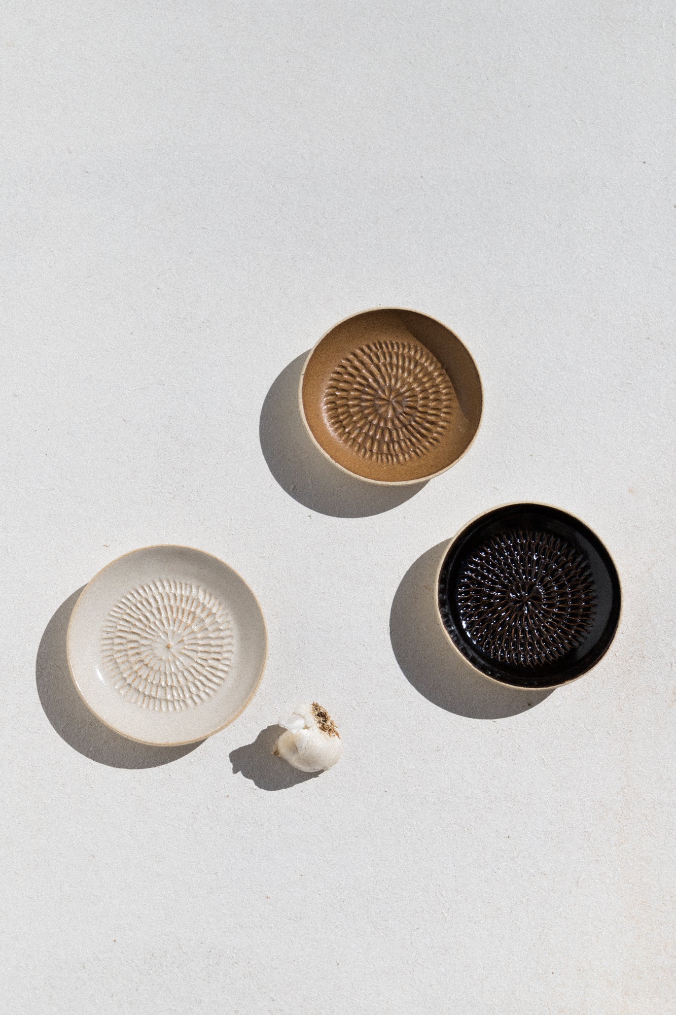 Kura studio ceramic garlic grater in ochre. From Maker's Mrkt Makers Market Melbourne
