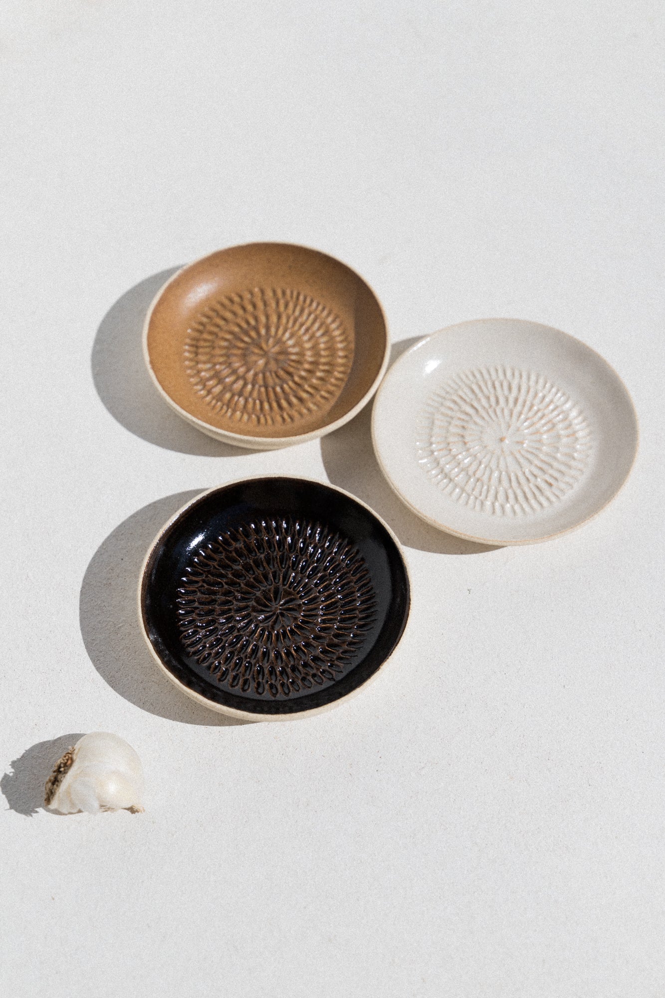 Kura studio ceramic garlic grater in ochre. From Maker's Mrkt Makers Market Melbourne